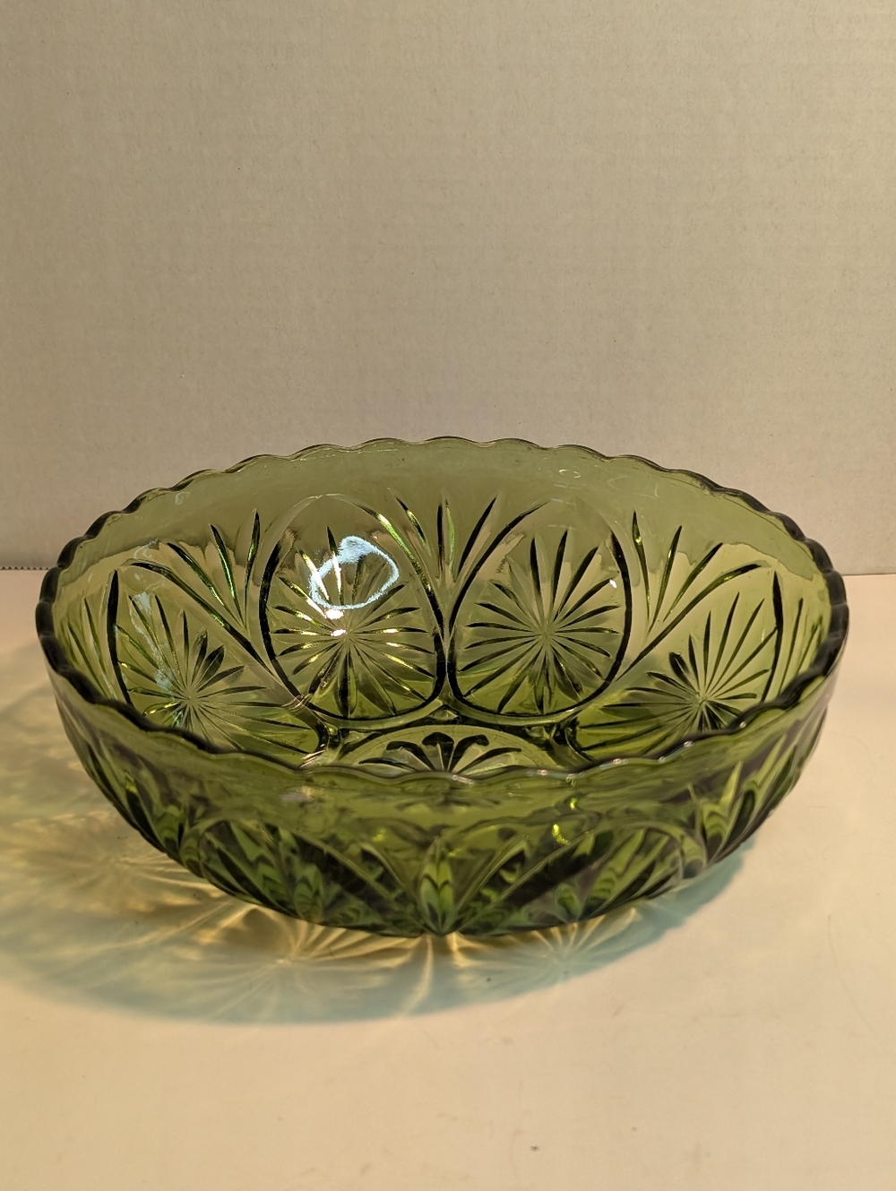 Indiana Green Glass Starburst Serving Bowl Round Scalloped Edge.